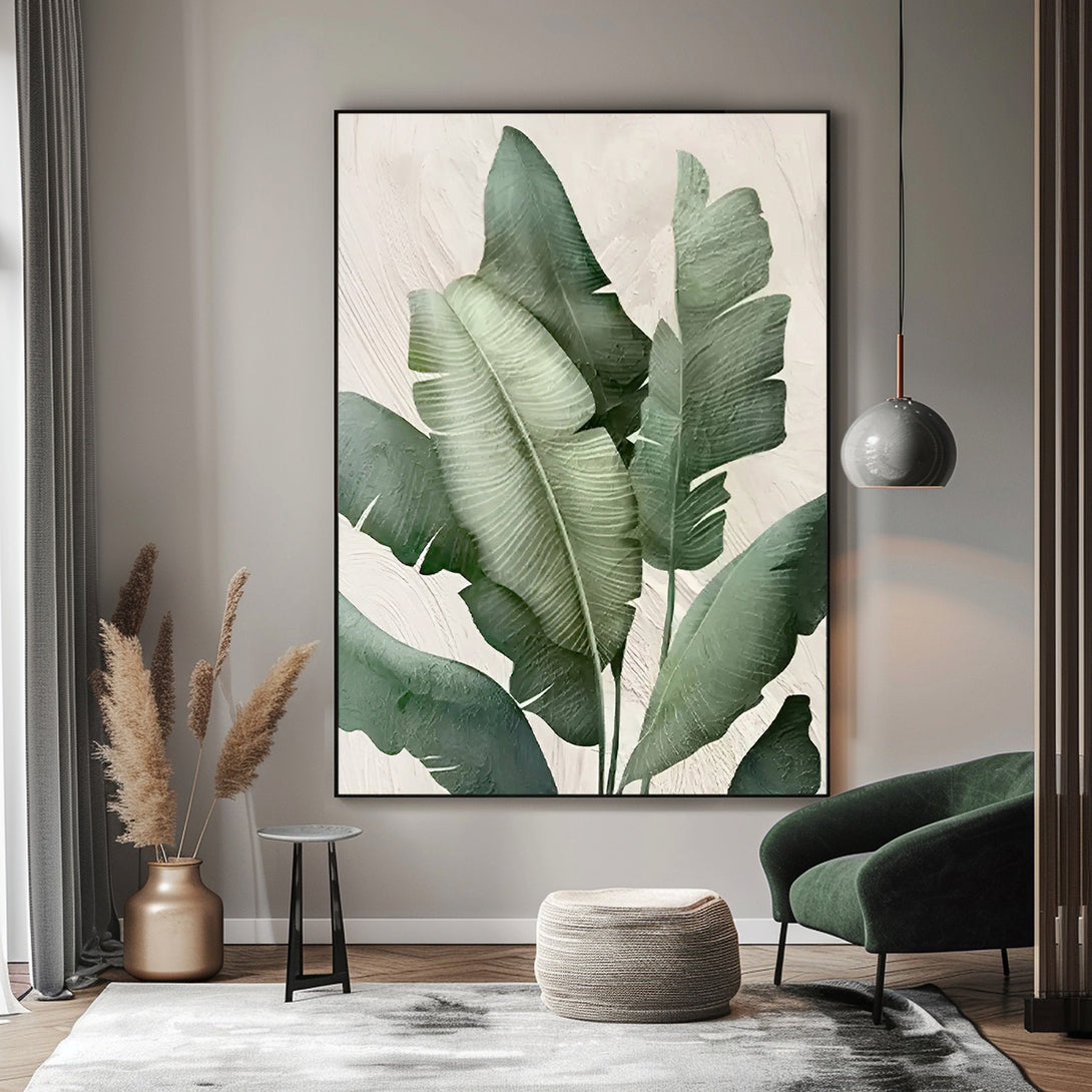 An abstract canvas painting of green leaves against a white backdrop 