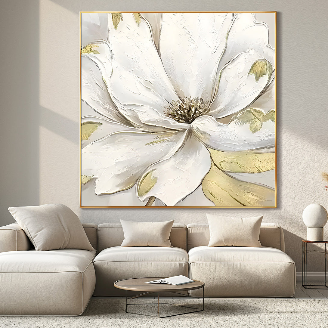 A square abstract painting featuring a large white flower with shades of gold