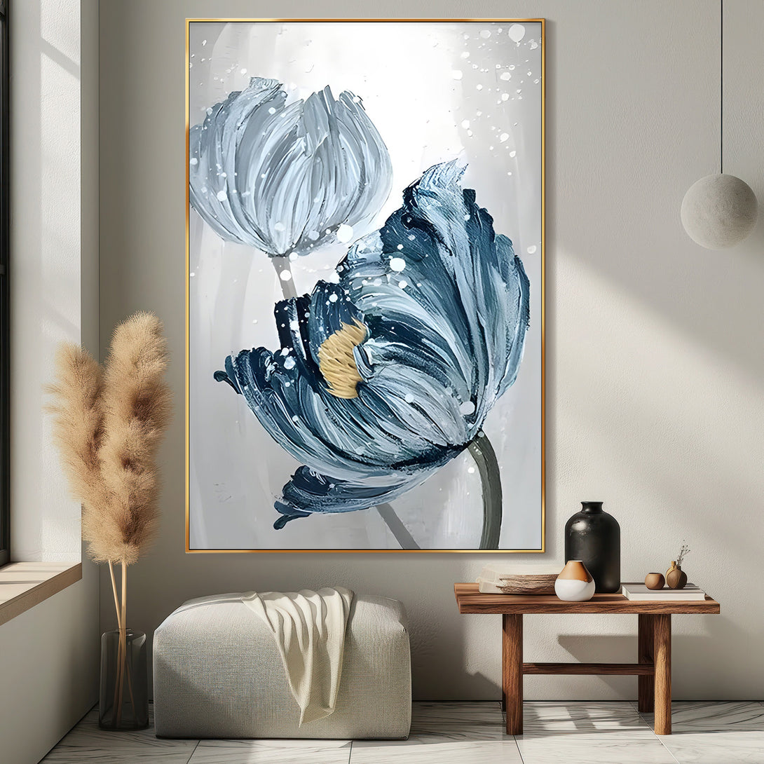 A large vertical painting of 2 blue flowers in a white or grey background. 