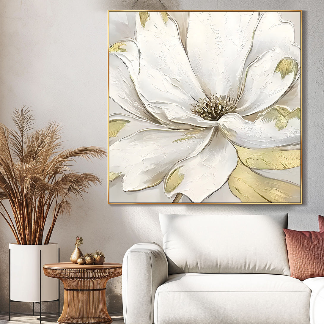 A square abstract painting featuring a large white flower with shades of gold