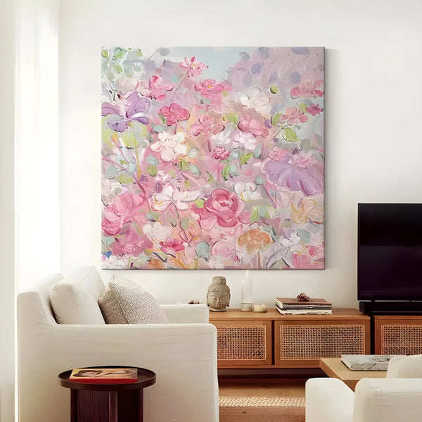 A square abstract painting full of flowers in pink, white, purple, orange, etc. 