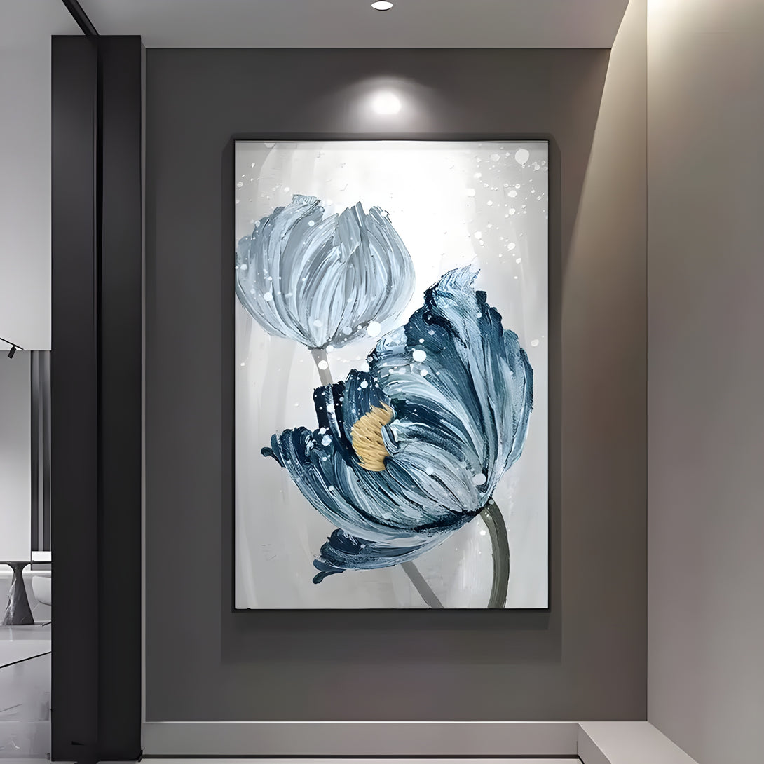 A large vertical painting of 2 blue flowers in a white or grey background. 