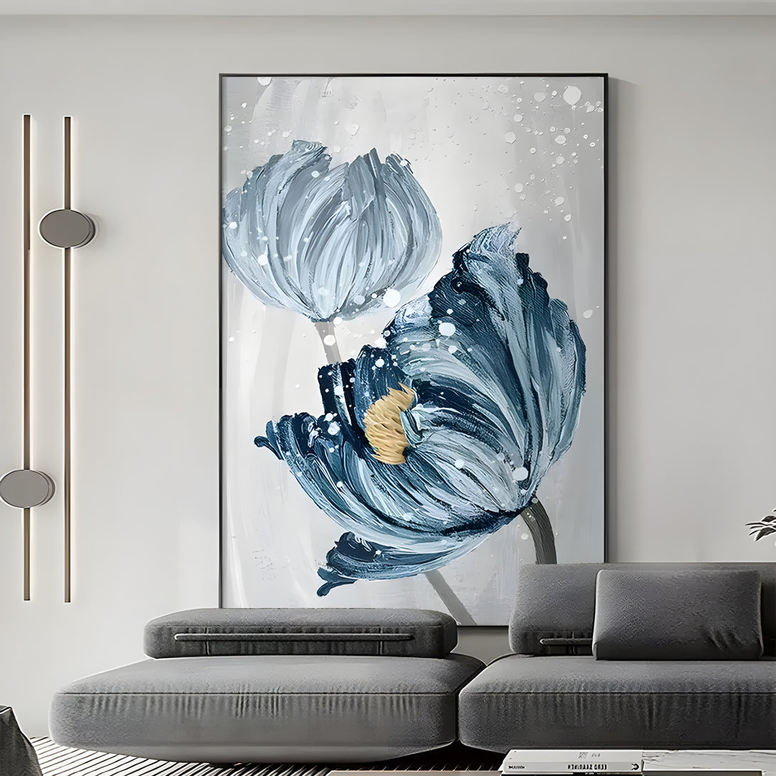 A large vertical painting of 2 blue flowers in a white or grey background. 