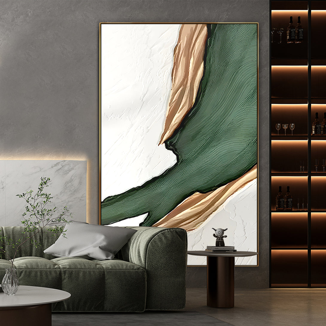 A large abstract painting with white, green and gold shades. 
