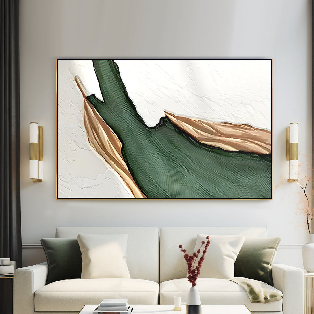 A large abstract painting with white, green and gold shades. 
