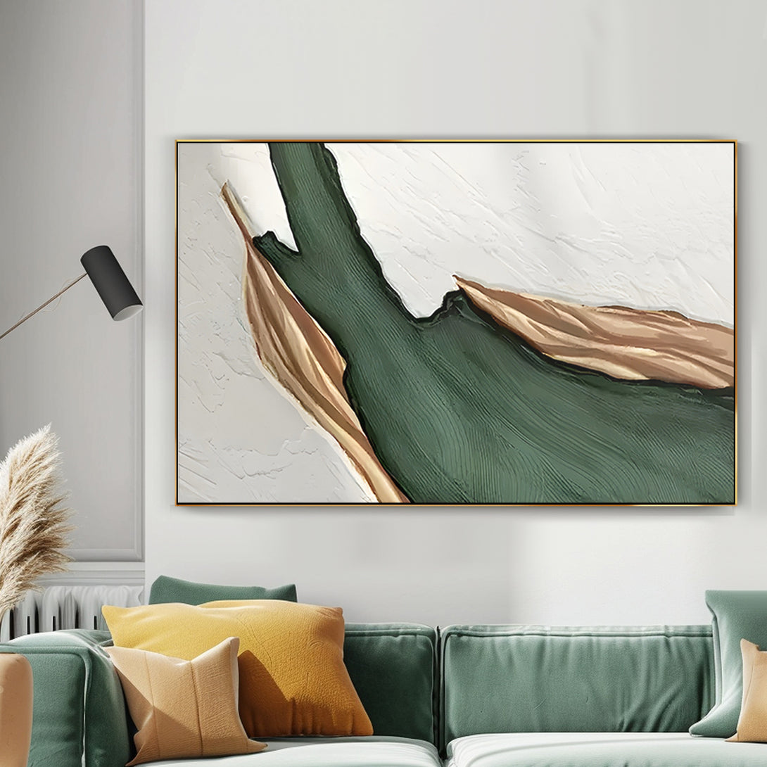 A large abstract painting with white, green and gold shades. 
