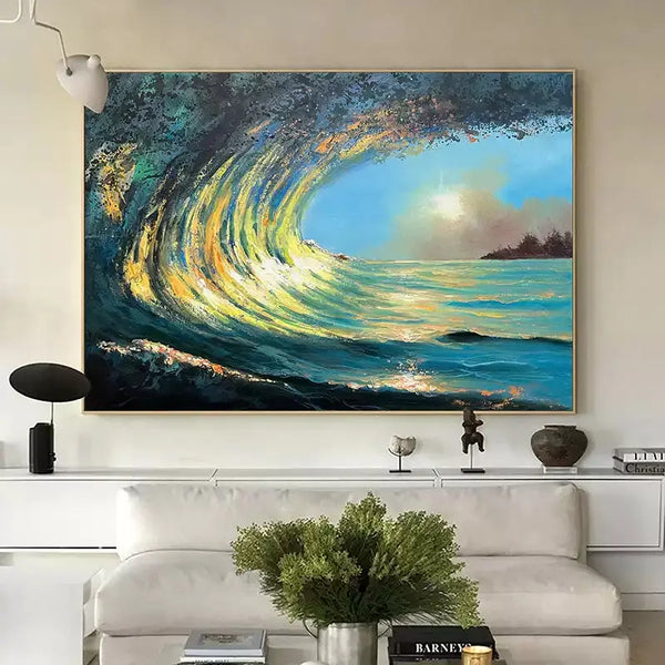 A large horizontal wall art of the blue sea waves rising high and forming a half circle in the air