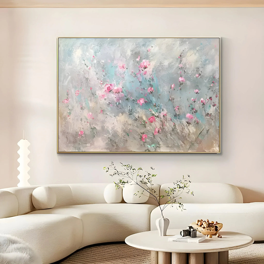 A horizontal abstract painting of blue and pink wildflowers with textured brushwork across a landscape setting.