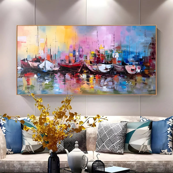 A horizontal abstract seascape painting with colorful docked boats in pink, blue, purple, and yellow tones reflecting on textured ocean water at night