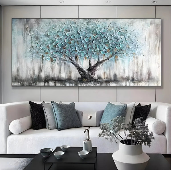 A horizontal abstract tree painting in teal blue tones with textured branches extending across a wide canvas.
