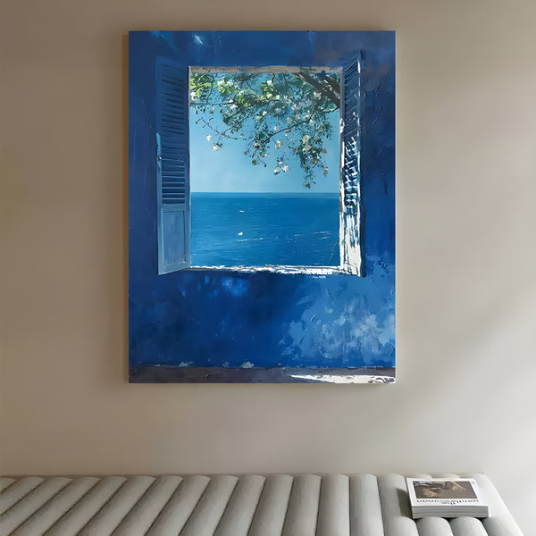 A large blue textured painting of a blue wall featuring an open window,  framing a view of the tranquil blue sea beneath a lush green tree and delicate white blossoms.
