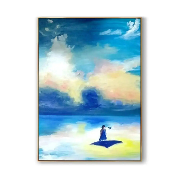 A large canvas wall painting in vibrant blue, white, and yellow hues, depicting a brilliant blue sky with wispy blue and yellow clouds. Below, a serene blue sea features a whimsical scene of a girl standing on the head of a fish.
