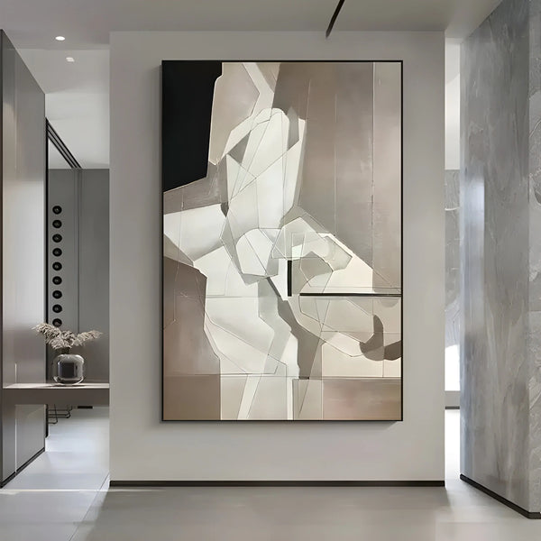 A large minimalist wall art in Wabi-Sabi style, mixing grey, black and beige tones. 