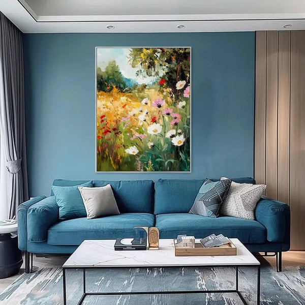 A large painting of a vibrant field of flowers 