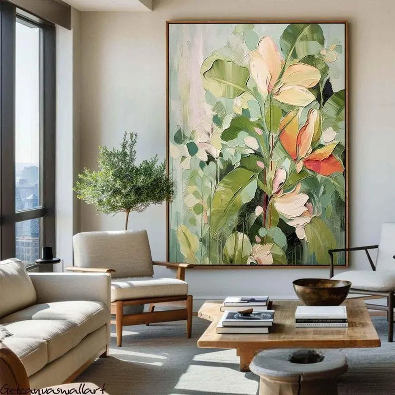 A large textured wall art of a tall green plant with pink flowers and green leaves, against a light green backdrop.