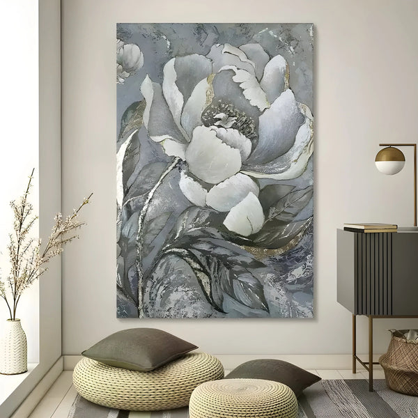 A large, vertical abstract flower painting in grey and white tones featuring textured petals and a soft landscape background.