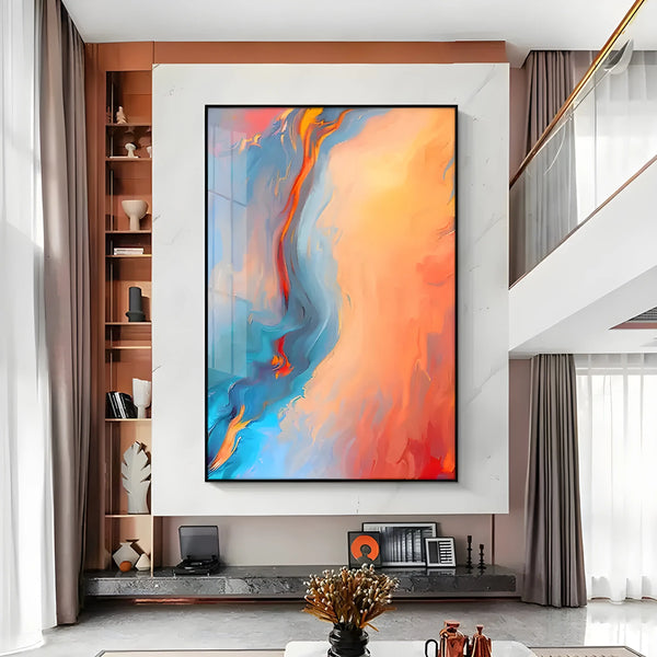 A large vertical abstract painting blending flame-like orange and blue hues 

