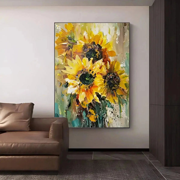 A large vertical textured floral wall art of 4 bright yellow sunflowers against a green backdrop.