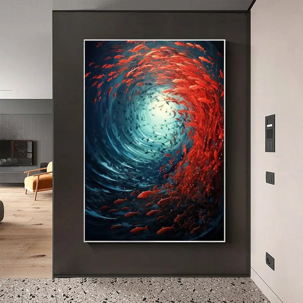 A large vertical textured wall art of a swarm of red fishes swimming in a swirl in the blue ocean. 