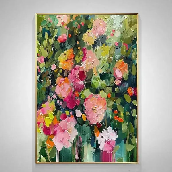 A large vertical textured wall art of pink flowers against abstract green leaves
