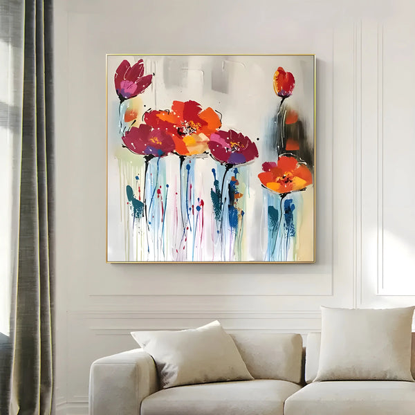 A square abstract floral painting with textured vivid orange petals and blue stalks on a neutral background.