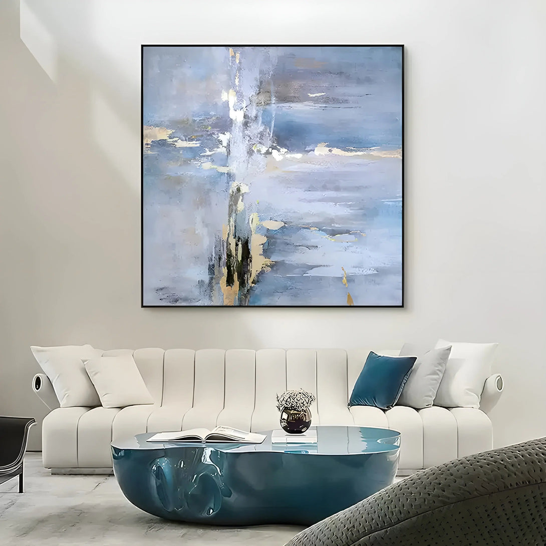 A squared layout abstract canvas featuring blue tones with gold accents and textured strokes, suggesting a minimalist path or journey.