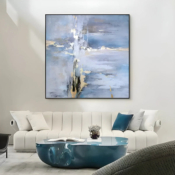 A squared layout abstract canvas featuring blue tones with gold accents and textured strokes, suggesting a minimalist path or journey.