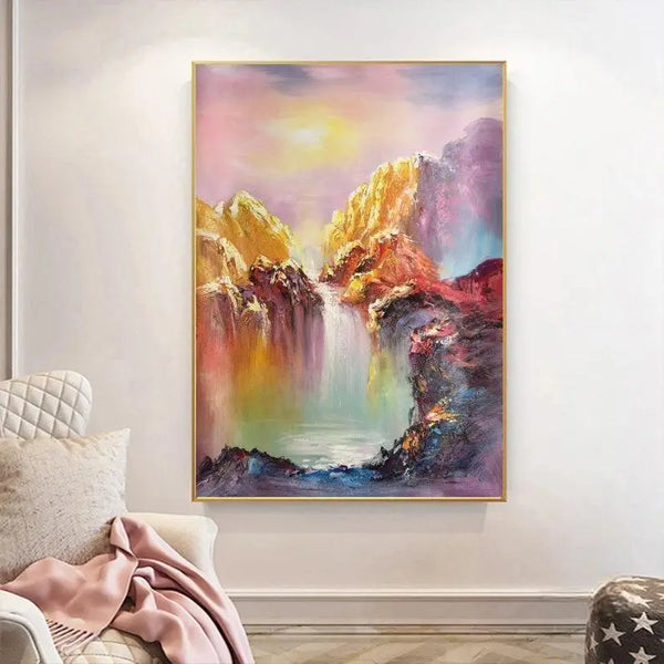 A vertical abstract landscape painting with yellow and pink tones, showing a flowing waterfall against layered mountain shapes at sunset.

