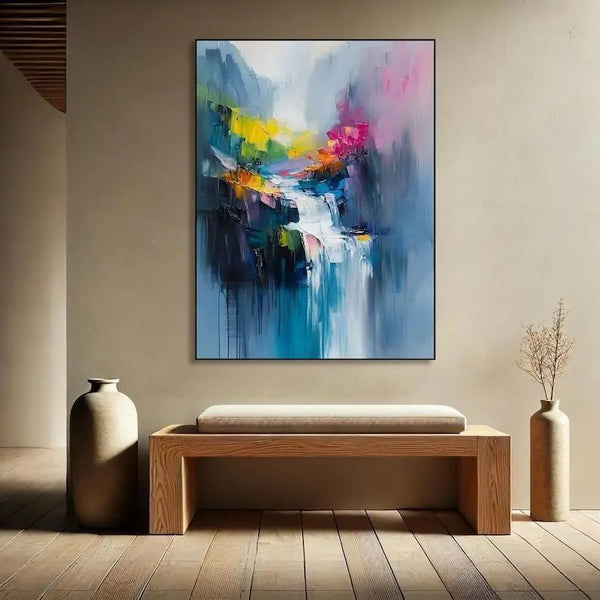 A vertical abstract painting of a colorful waterfall flowing through a layered mountain cliff, created with bold textured brush strokes.