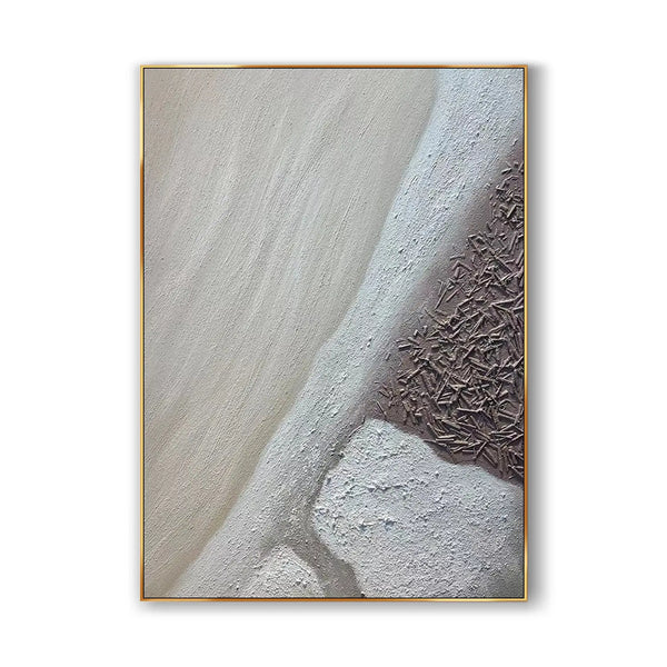 A textured Wabi-sabi wall art depicting the ocean in beige and the sandy beach in white and brown.