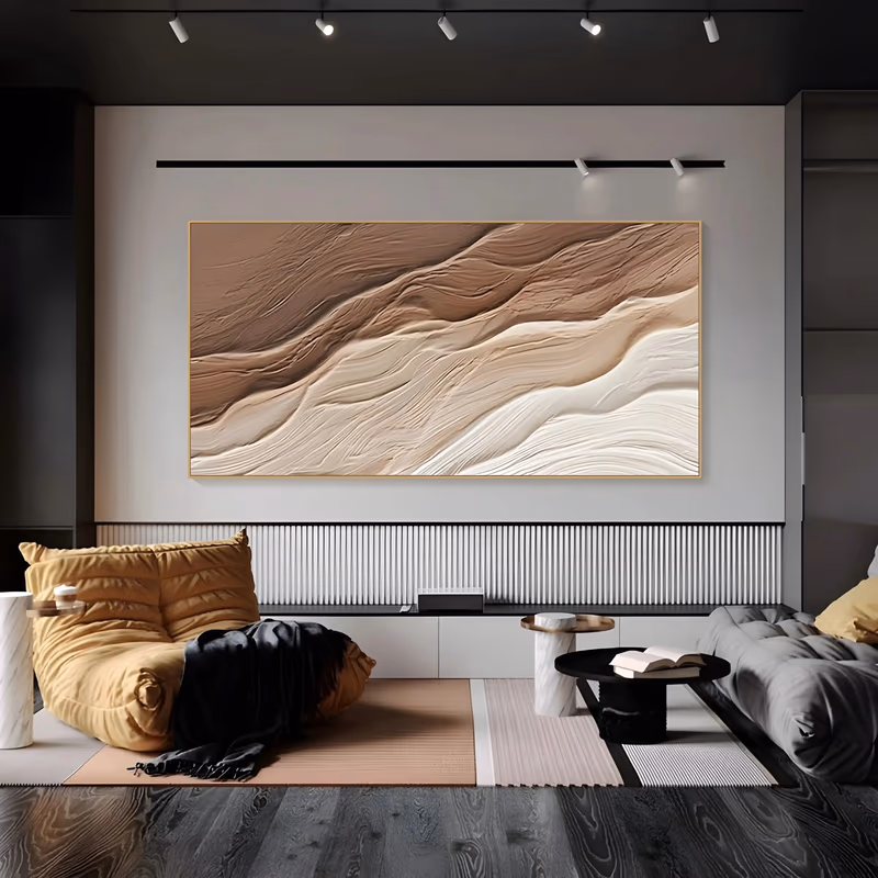 a wide panoramic relief painting of wind-carved plaster waves flowing from the upper left to the lower right, deep brown ridges above and cream and sand crests below, in sculpted 3D plaster