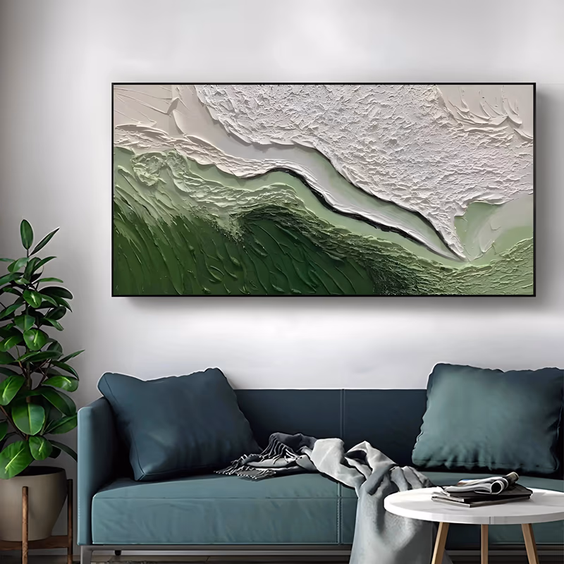 an oversized horizontal plaster relief painting of a wave, a deep green swell rolling in from the lower left against thick white foam above and pale sage water on the right, in sculpted 3D texture