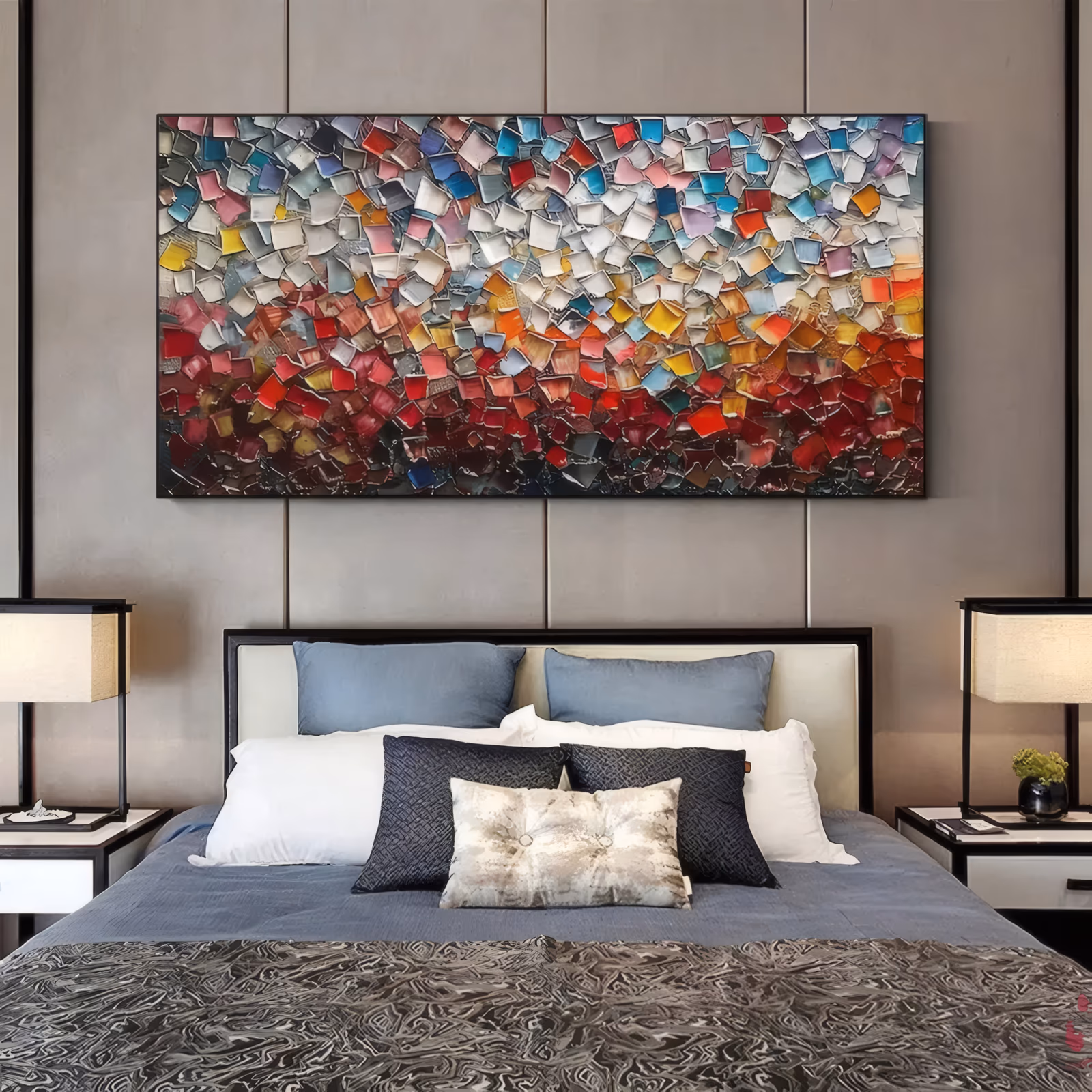 a large panoramic textured painting made of hundreds of small raised paint squares, grading from white, blue and pastel chips along the top down to deep red and crimson at the base, in sculpted relief impasto