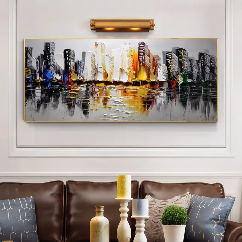 a panoramic impressionist cityscape painting of black and gray skyscrapers with a glowing yellow, orange, and white cluster at center and blue and red accents, mirrored in gray water below, in thick palette-knife oil