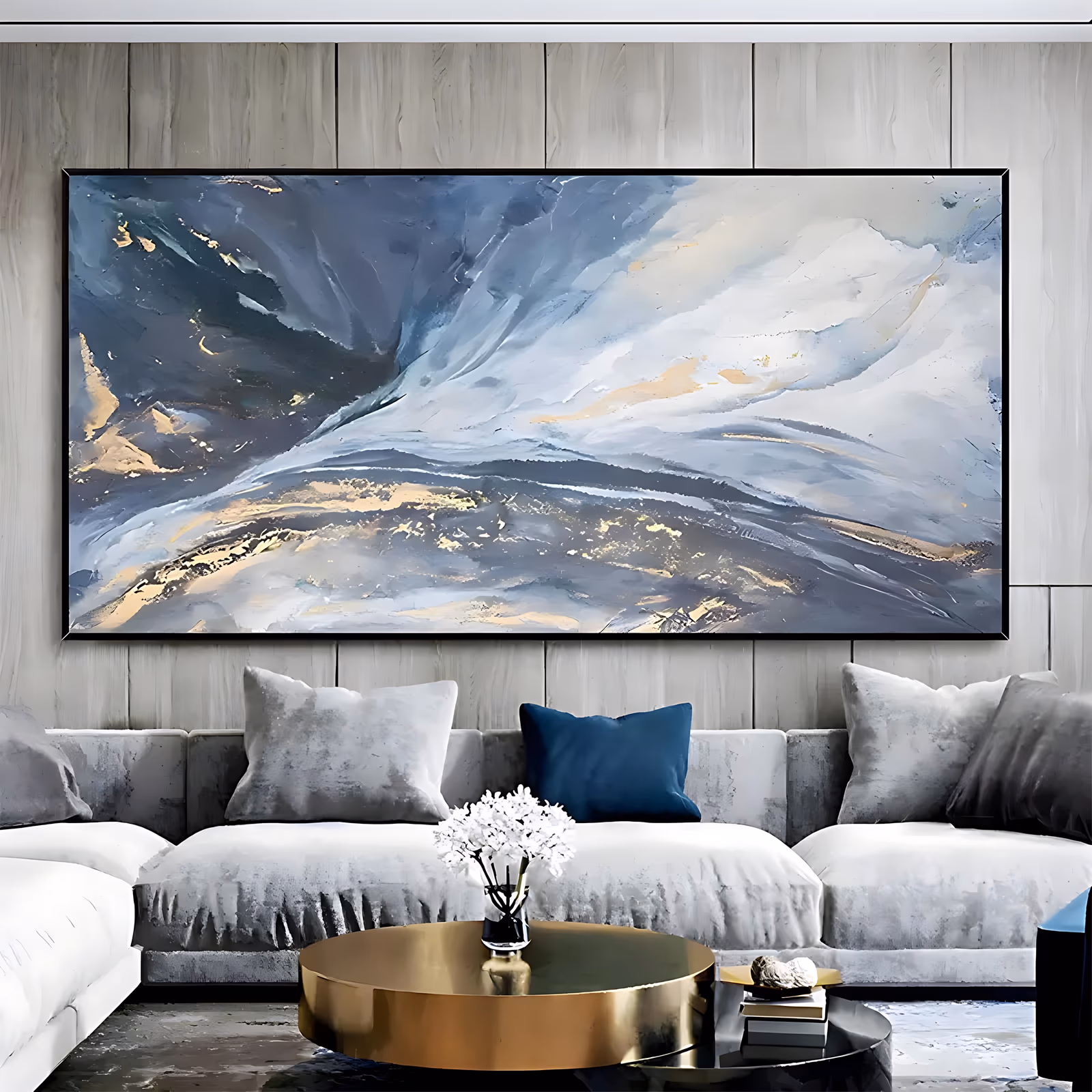 an oversized horizontal abstract painting of marbled rock-like forms, slate blue and charcoal on the left opening into white and pale gray on the right, veined with gold, in thick impasto oil