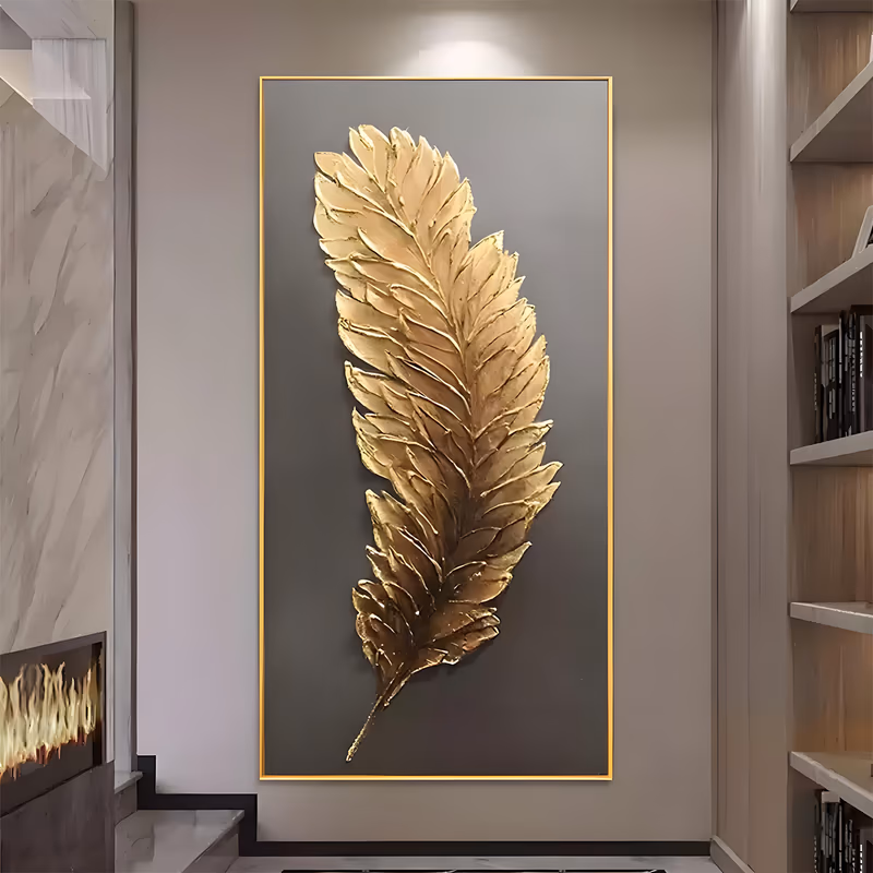 a large vertical textured wall art of one long gold feather set diagonally on a dark graphite ground, its barbs sculpted as separate raised petals catching light along the shaft, in heavy relief