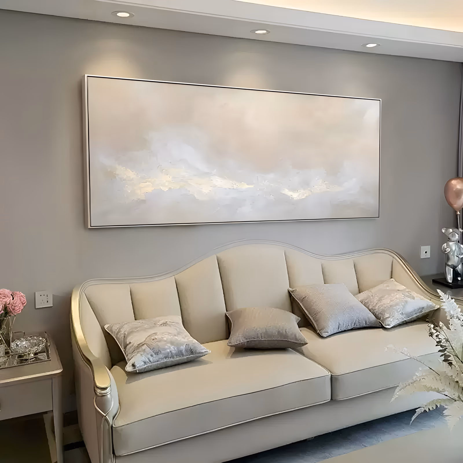 a wide panoramic abstract painting of a soft ivory and greige cloud band drifting along the middle of the canvas, lit from within by pale gold, built in thick impasto ridges