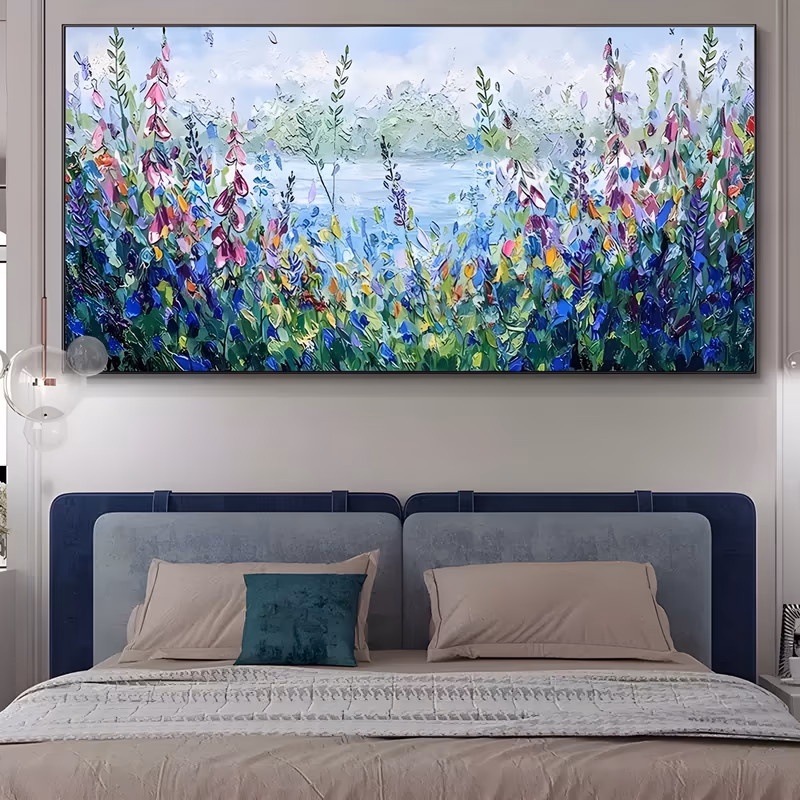 a wide panoramic palette-knife painting of pink foxgloves, purple lupins and blue wildflowers massed along the front, with a pale silver lake and soft green treeline behind them, in thick ridged impasto