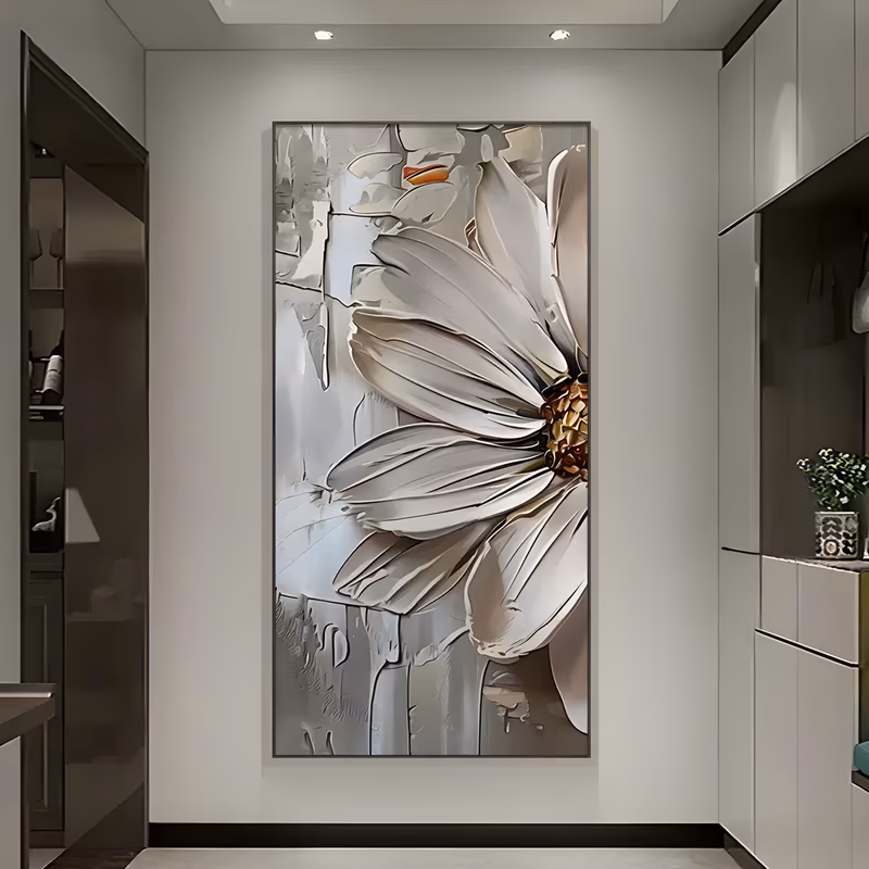 a tall vertical relief painting of one oversized white daisy cropped at the right edge, its long petals fanning left from a gold-brown center, on a gray ground of dripping palette-knife plaster