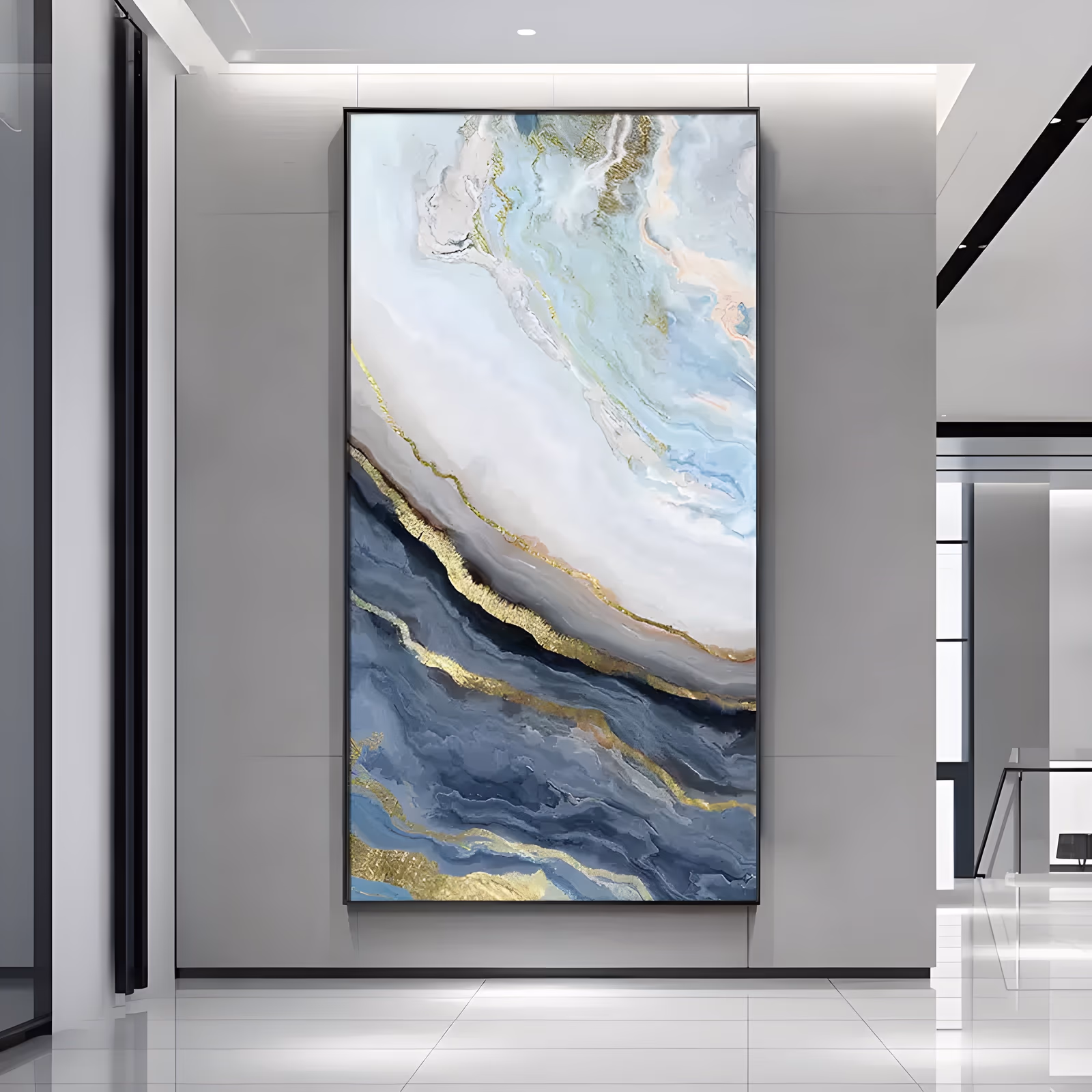 a tall vertical abstract painting of marbled blue and white flow on a diagonal, pale cream and aqua above, slate blue below, with gold veins tracing the seam, in smooth blended paint and gold leaf