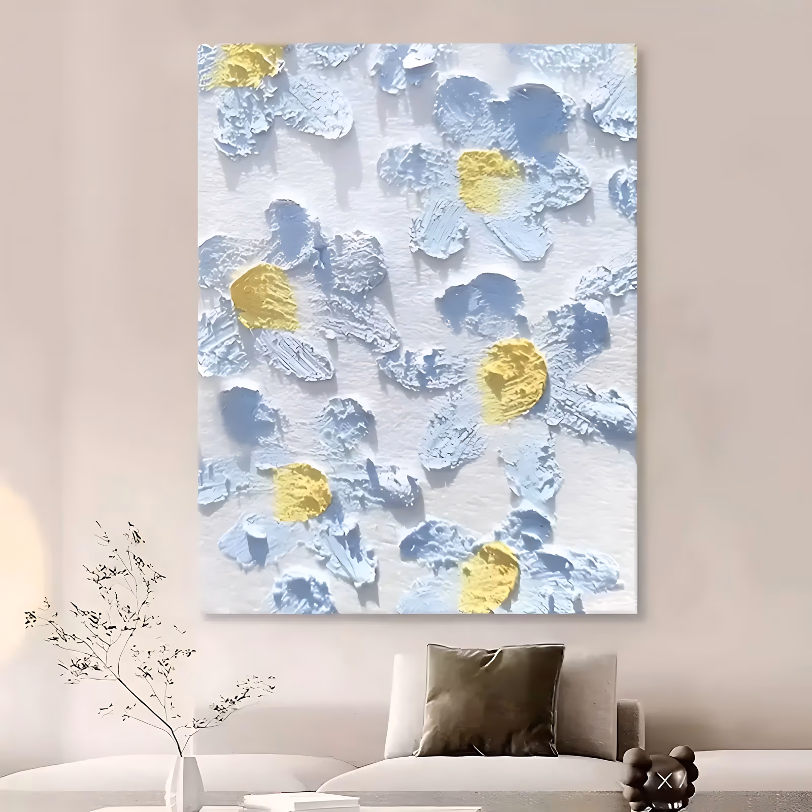a large vertical relief painting of white and pale blue five-petal daisies with butter yellow centers scattered evenly over a soft cream ground, each petal a separate thick stroke of raised paint