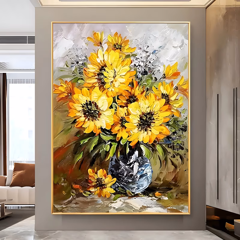 a vertical textured still life painting of a full bouquet of yellow and orange sunflowers with green leaves standing in a blue-gray ceramic vase, painted in thick palette-knife oil against a soft gray backdrop