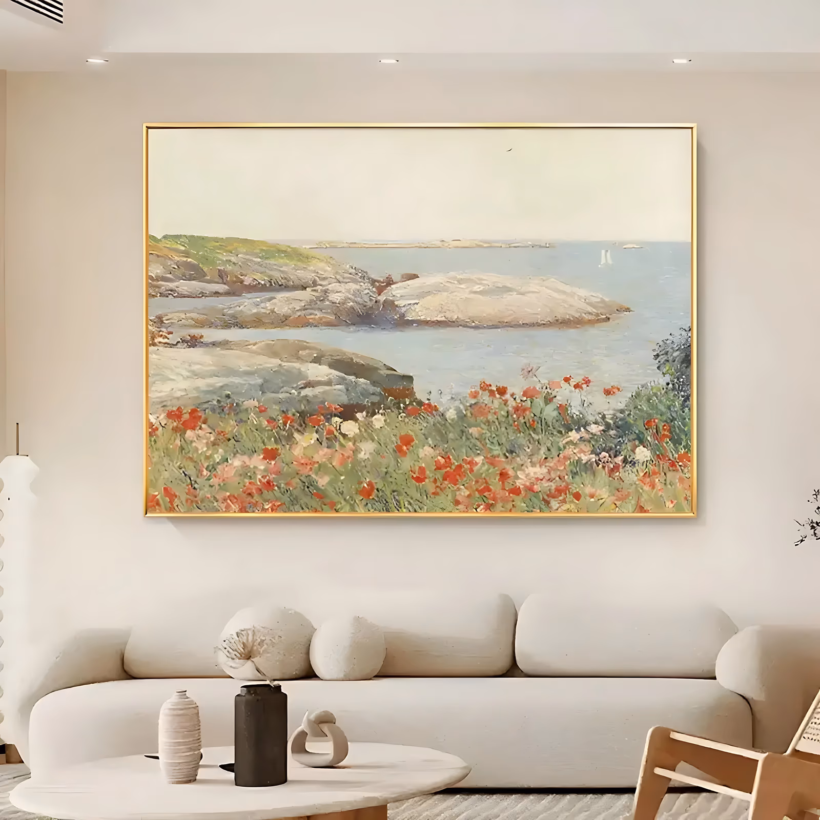 a large horizontal impressionist canvas painting of red and coral poppies in tall green grass in the foreground, with gray granite rocks, a pale blue bay and two small sailboats beyond, in thinly brushed oil