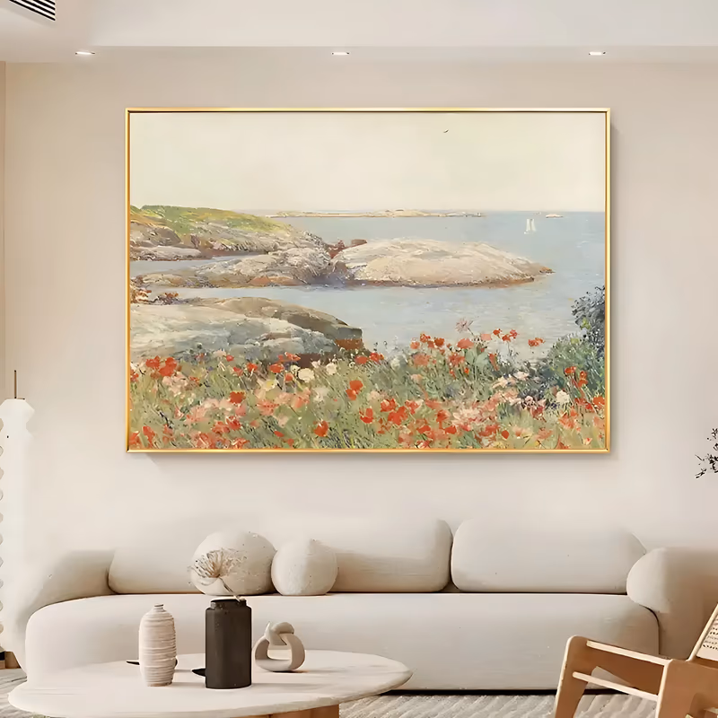 a large horizontal impressionist canvas painting of red and coral poppies in tall green grass in the foreground, with gray granite rocks, a pale blue bay and two small sailboats beyond, in thinly brushed oil