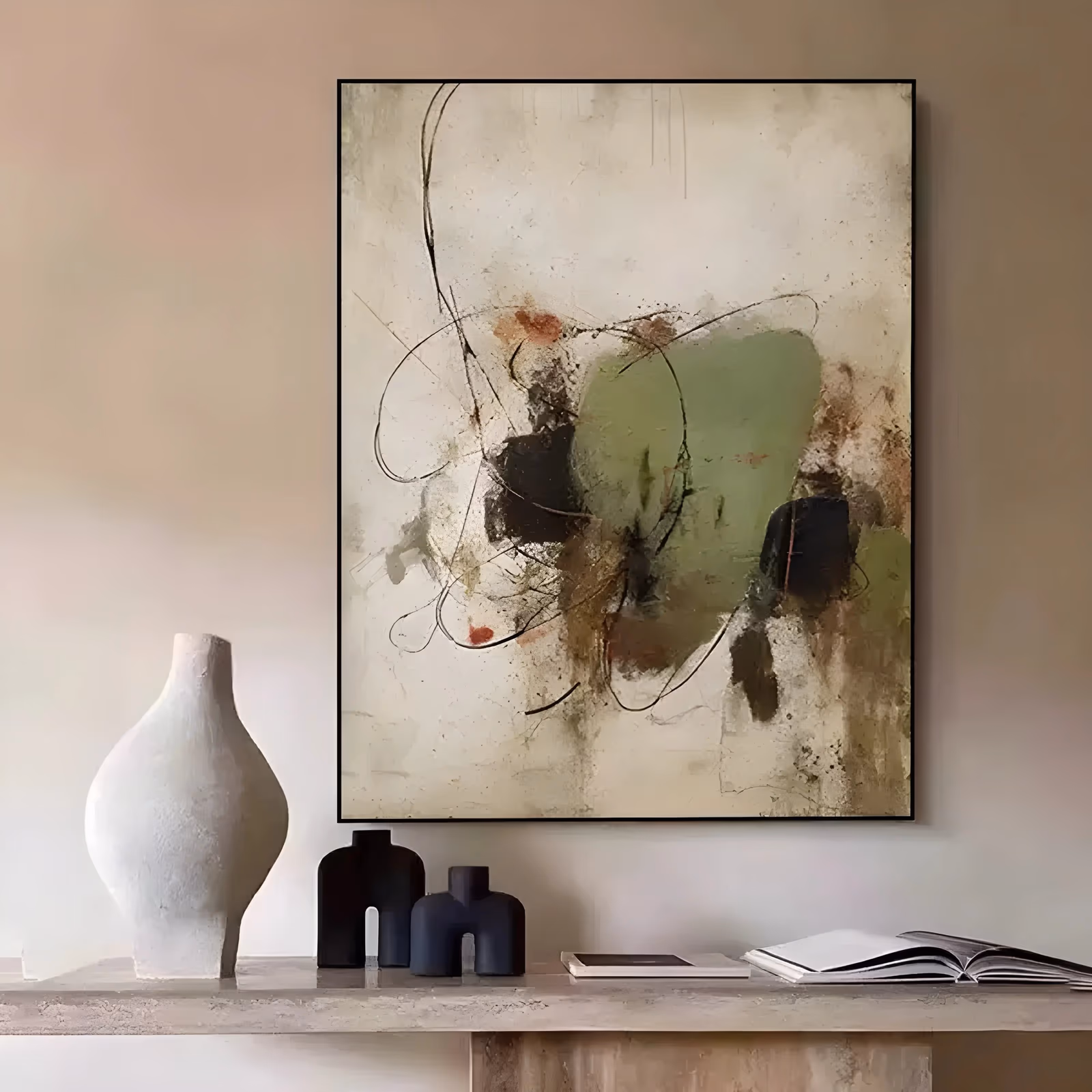 a large vertical abstract painting with a soft sage green block at the center, black smudges and small rust dots around it, and thin looping ink lines circling over a mottled cream and beige ground, in dry washed paint