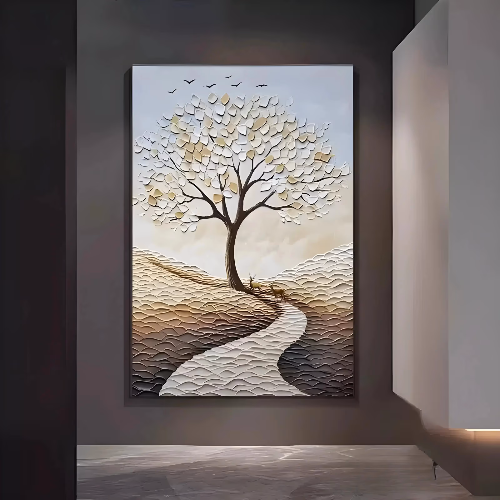 a large vertical relief painting of a white plaster tree with gold and cream leaves, two small deer on a winding pale path and sculpted beige and brown hills below, with birds in the sky
