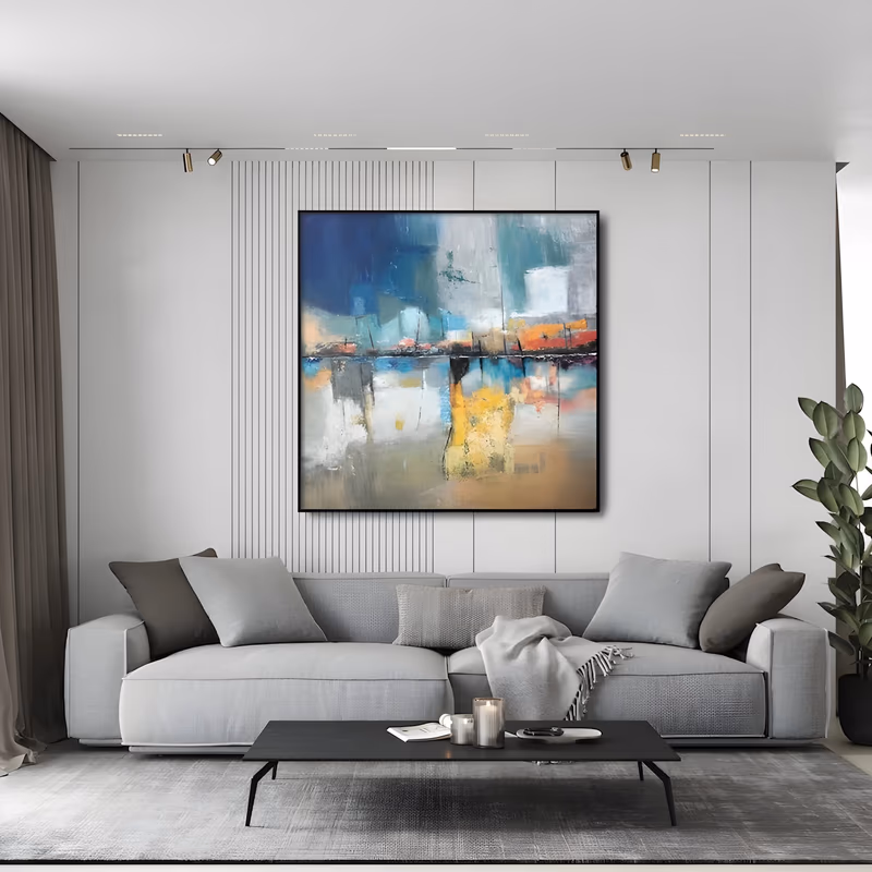 a large square abstract painting of a waterfront skyline in blue, teal, gray and white blocks above a dark horizon, mirrored below in yellow, tan and white reflections with small orange marks, in thick knife-laid oil