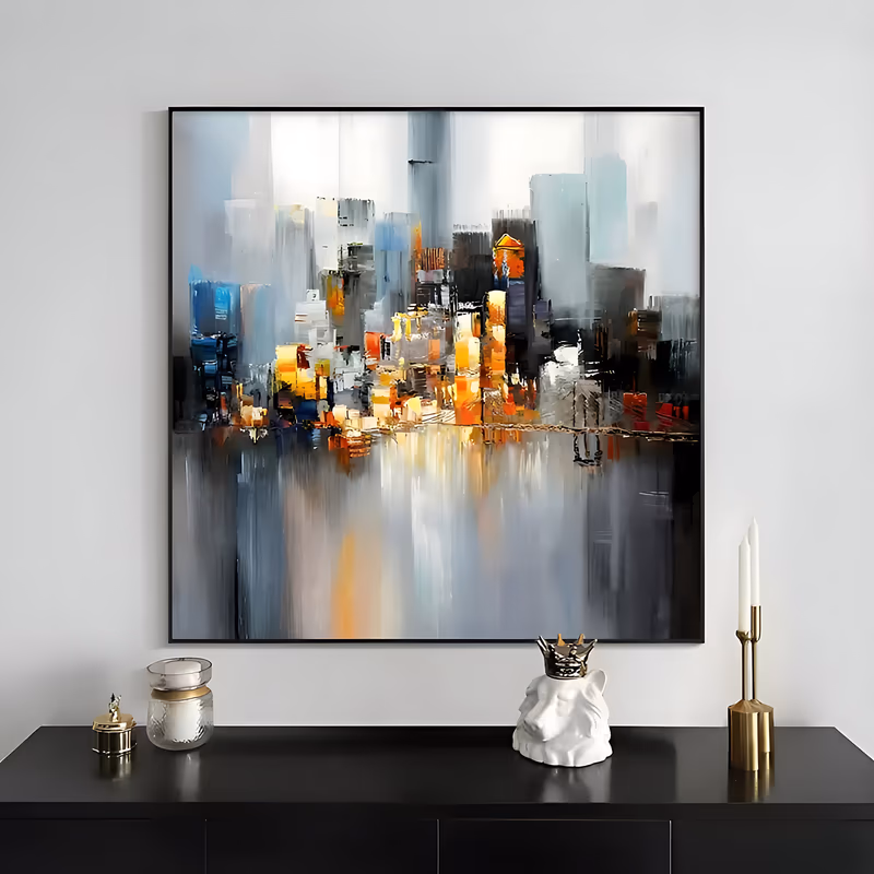 a square impressionist canvas painting of a loose gray and white city skyline, its mid-section lit with orange and gold windows that streak down in long reflections on the dark water below, hand-painted in acrylic