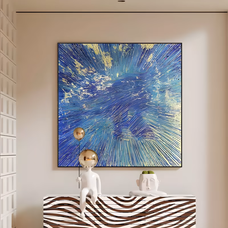 a large square abstract painting of fine ridged lines radiating from the center in cobalt and turquoise blue, flecked with gold and white and deepening to purple at the corners, in combed impasto