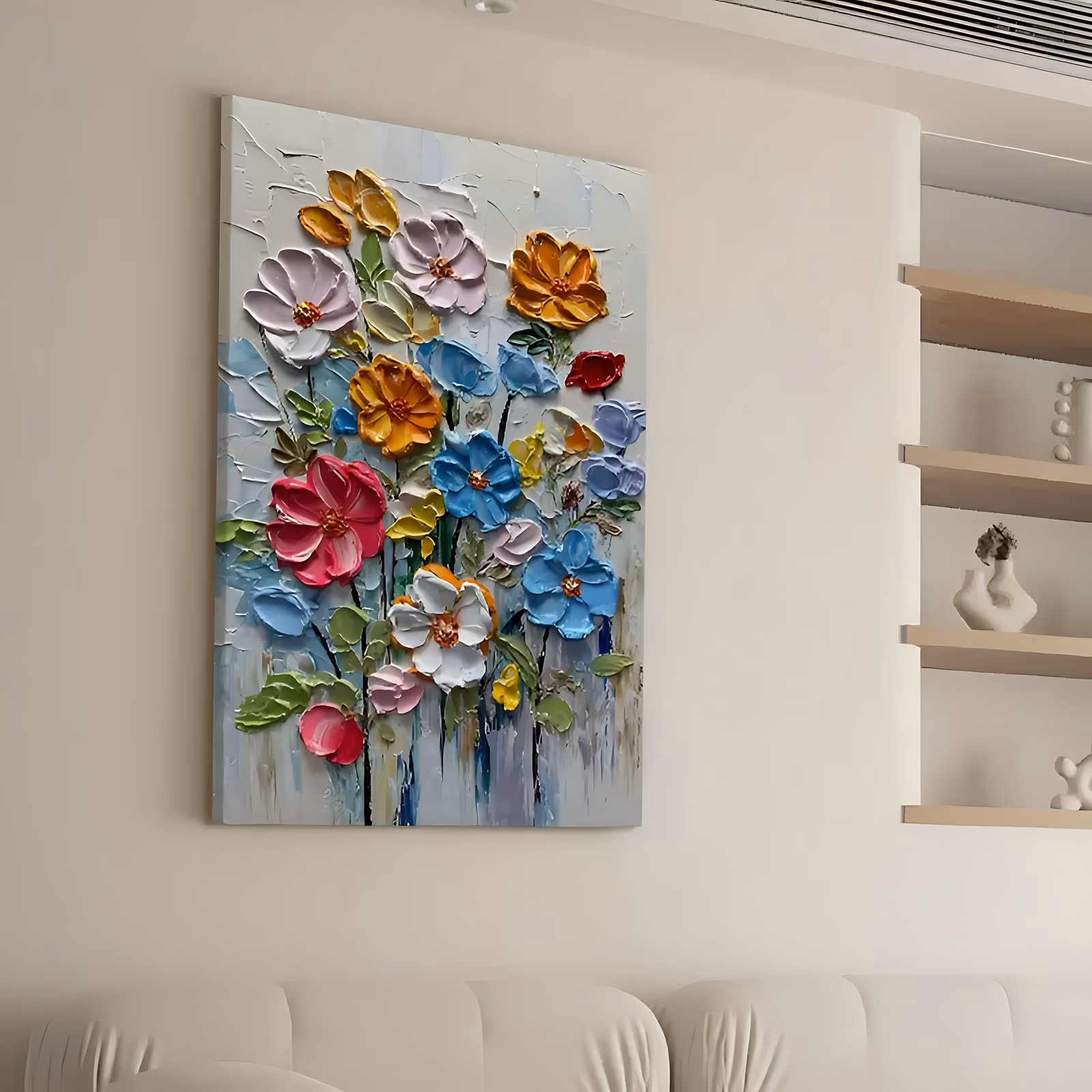 a large vertical sculpted flower painting of wildflowers on thin black stems, pink, sky blue, orange, yellow and white blooms with raised gold centers spread over a white textured ground, in thick relief